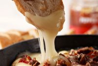 Baked Brie with Pepper Jelly and Toasted Pecans Recipe