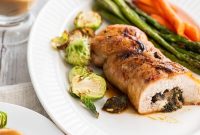 Bacon-Wrapped Stuffed Turkey Breast with Mushrooms and Veggies