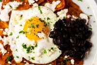 Authentic Red Chilaquiles Recipe: Crispy Tortillas in Spicy Salsa