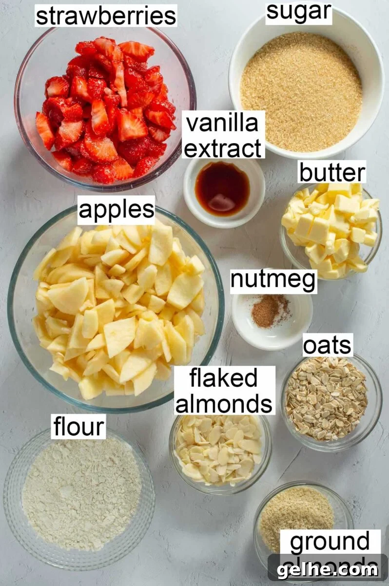 Labelled ingredients including strawberries, sugar, vanilla extract, apples, butter, nutmeg, flaked almonds, oats, flour and ground almonds.
