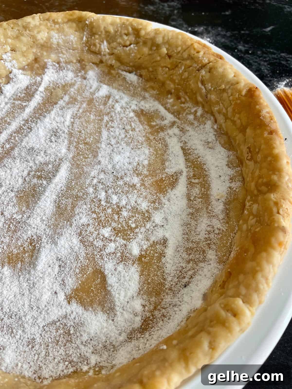 Classic Southern Pecan Pie Recipe: Authentic, Easy-to-Follow Instructions 6 Crust dust sprinkled on blind baked pie shell.