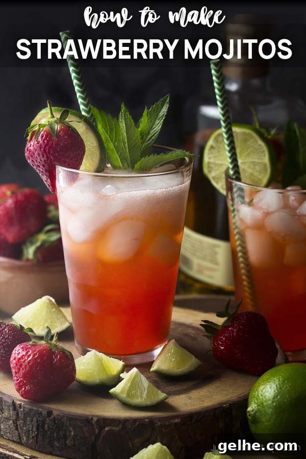Two pink cocktails in tall glasses with text overlay - Strawberry Mojitos.