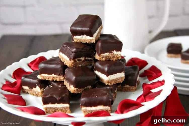 Cannoli Cheesecake Bites stacked on plate