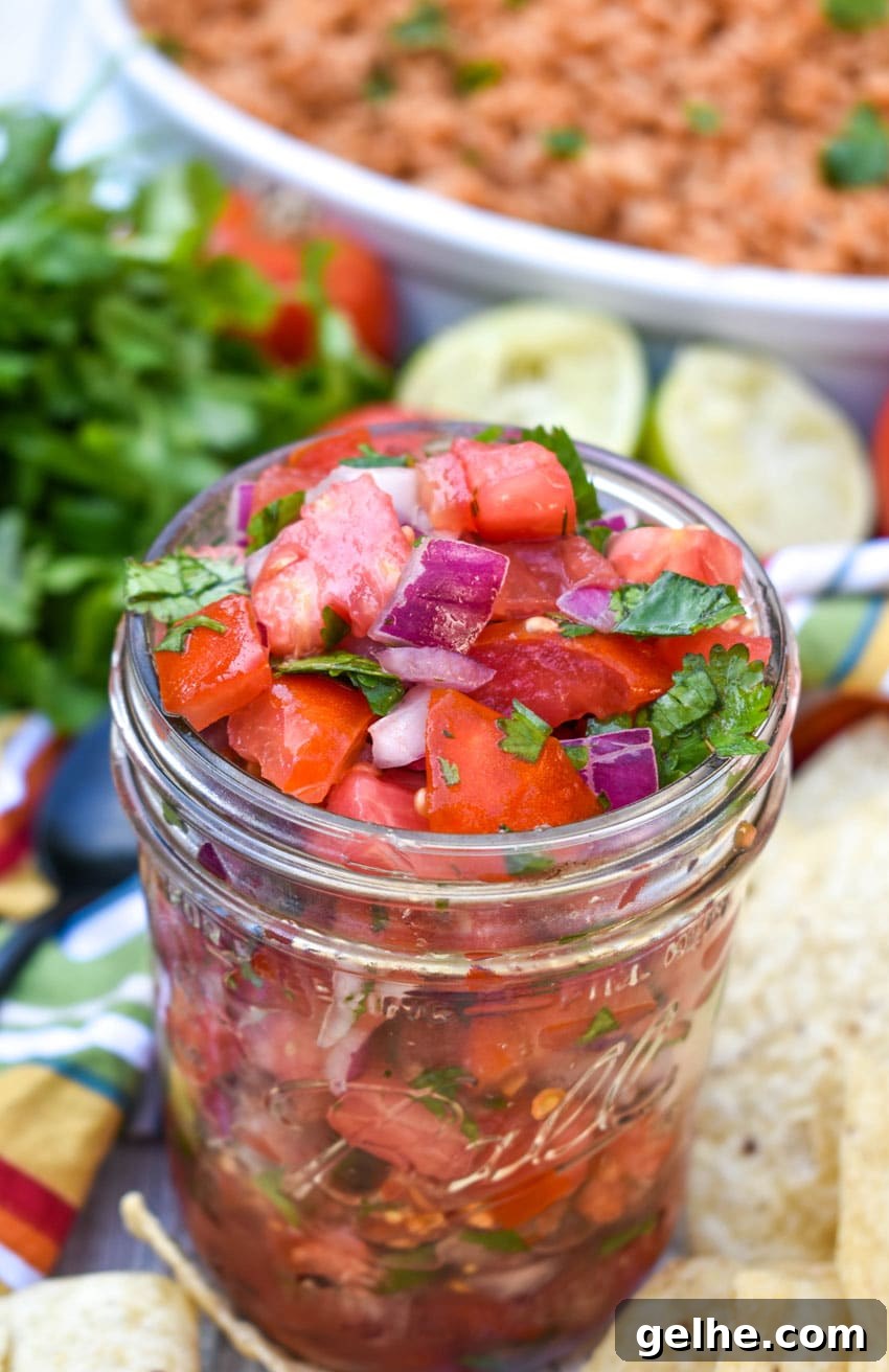 homemade pico de gallo in a small glass jar