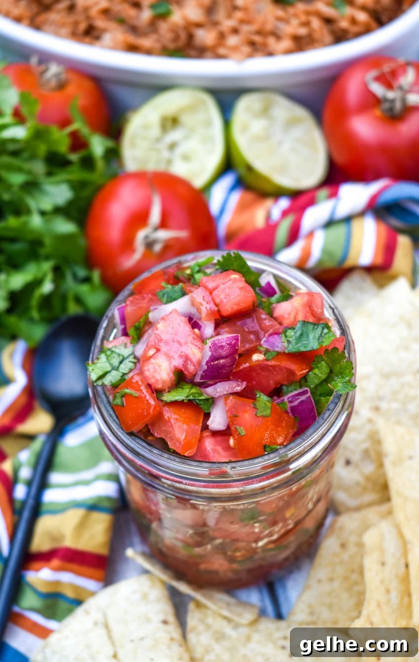 homemade pico de gallo in a small glass jar