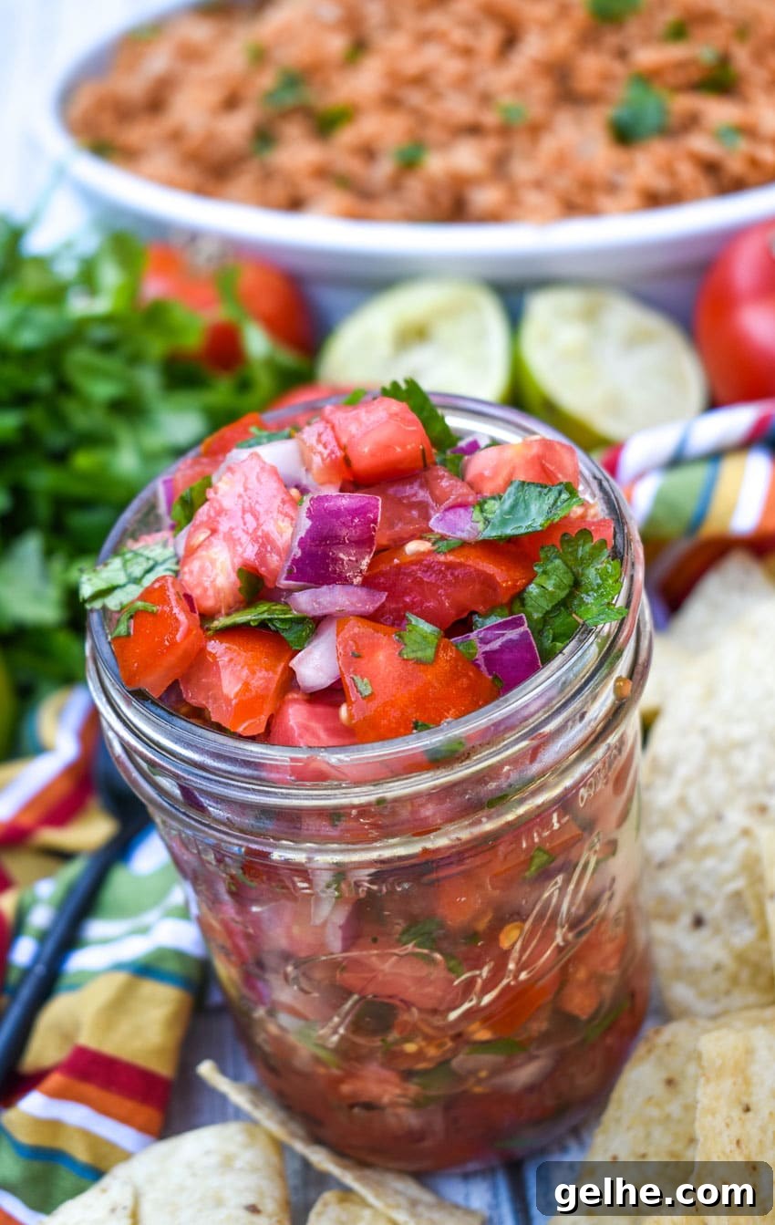 homemade pico de gallo in a small glass jar