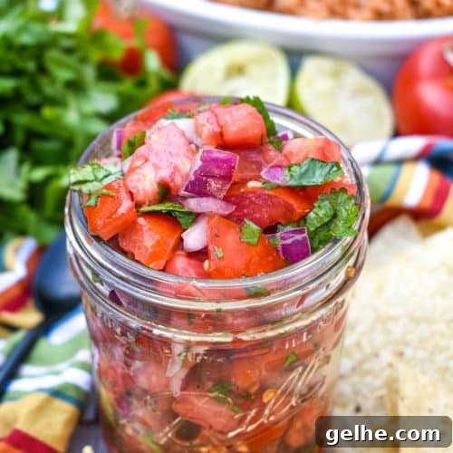 homemade pico de gallo in a small glass jar