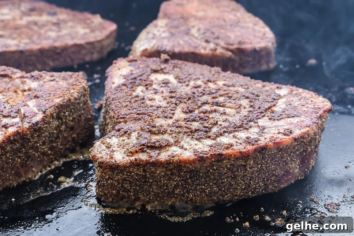 Cooking tuna steaks on the griddle
