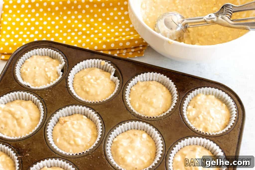 Banana and Cottage Cheese Muffins with Moist Texture 8 overhead shot of paper liners being filled with batter
