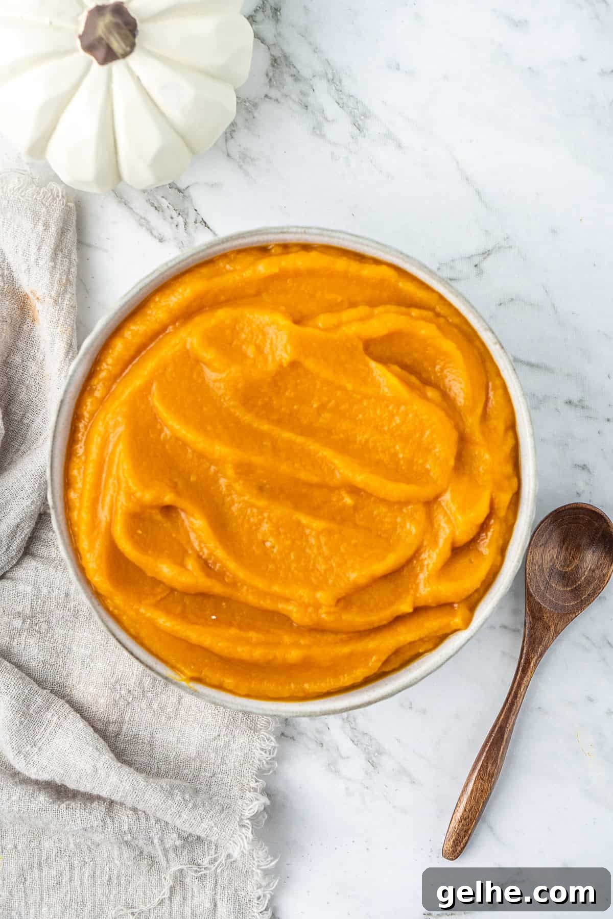 How to Make Smooth Homemade Pumpkin Puree for Baking 2 Pumpkin puree in a bowl.
