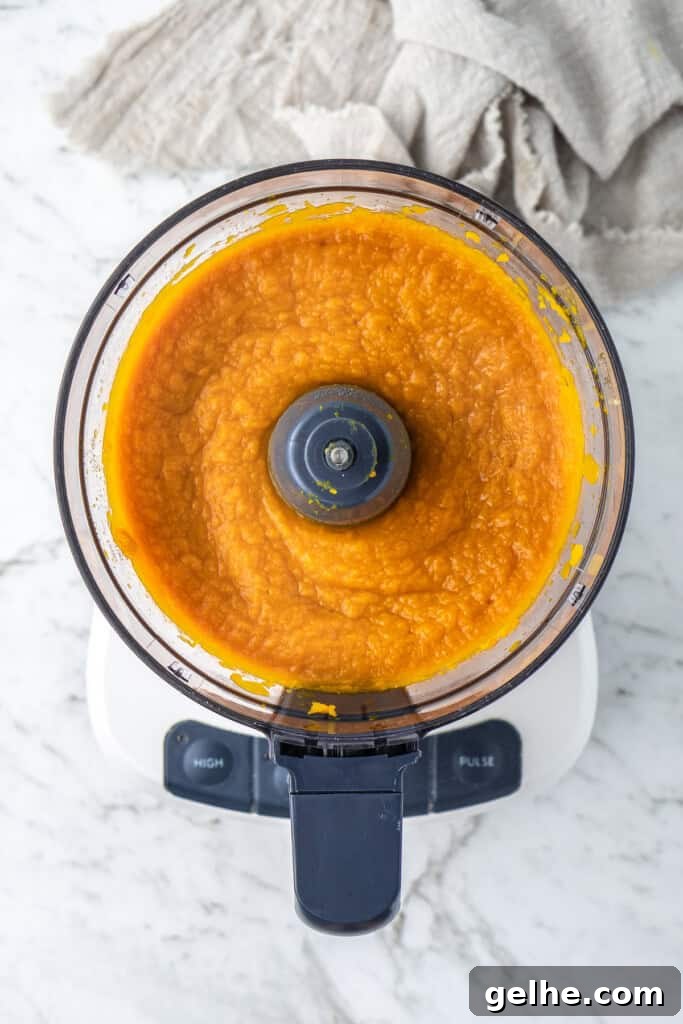 How to Make Smooth Homemade Pumpkin Puree for Baking 11 Pumpkin puree in a food processor.
