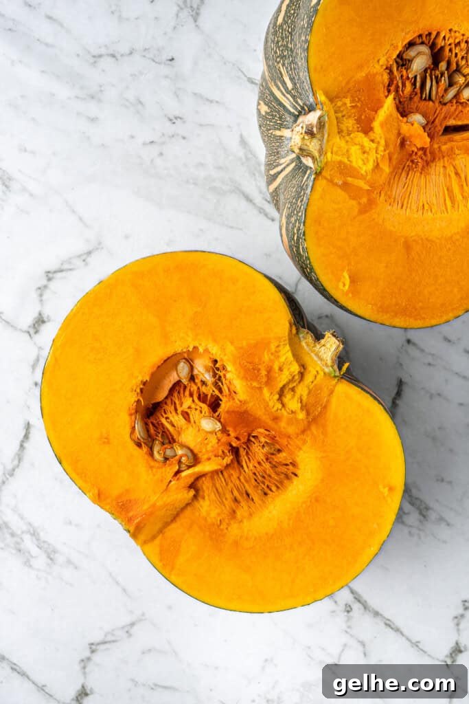 How to Make Smooth Homemade Pumpkin Puree for Baking 5 The pumpkin cu in half.