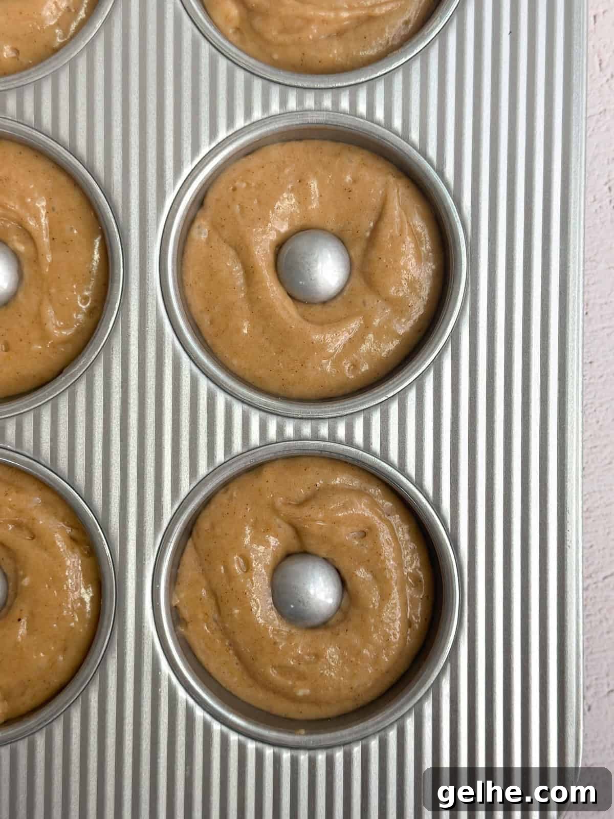 Baked Apple Cider Donuts Recipe | Light Autumn Donut Treat 7 batter into donut pan.