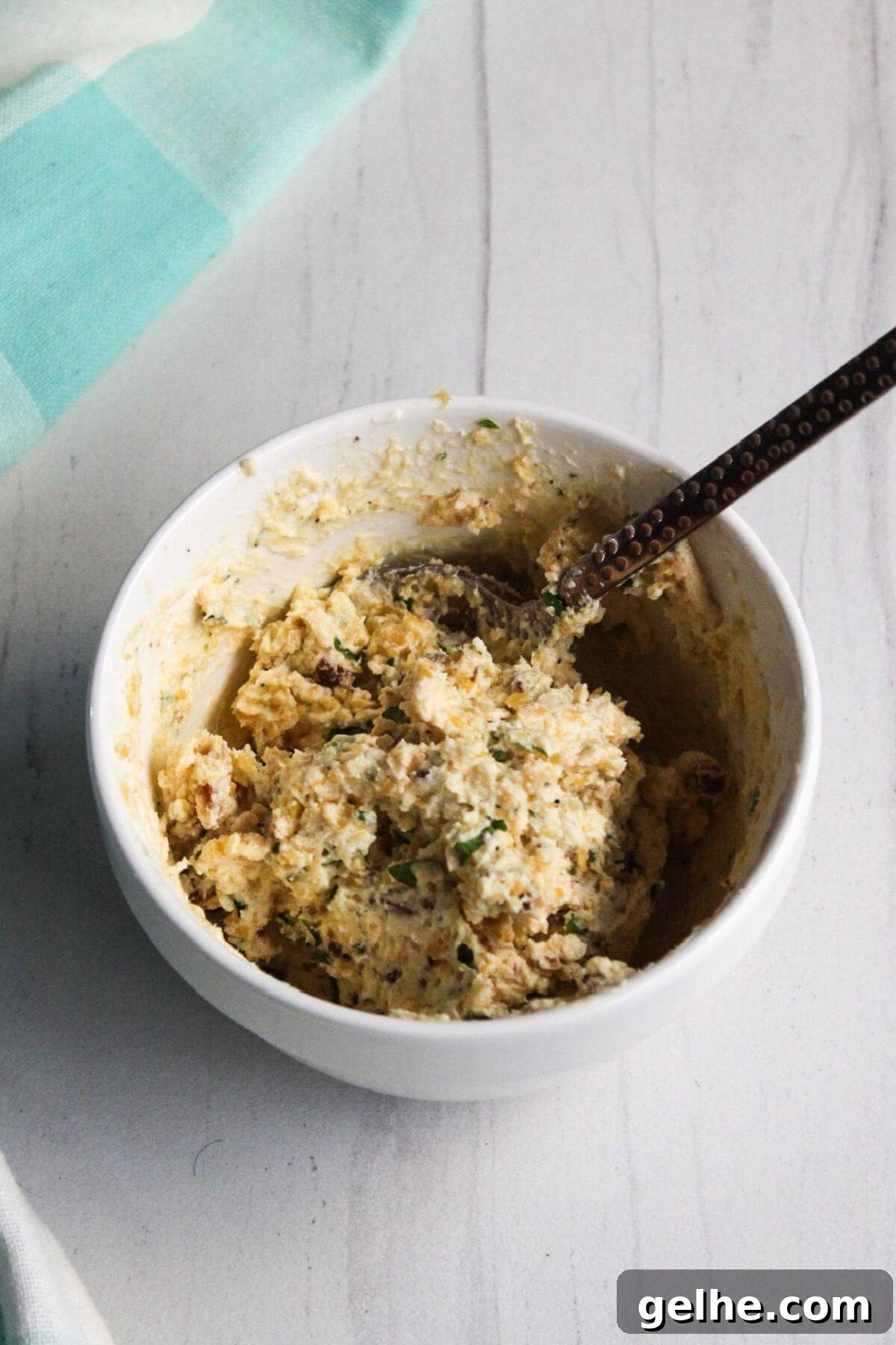 Stuffing mixture in medium mixing bowl.