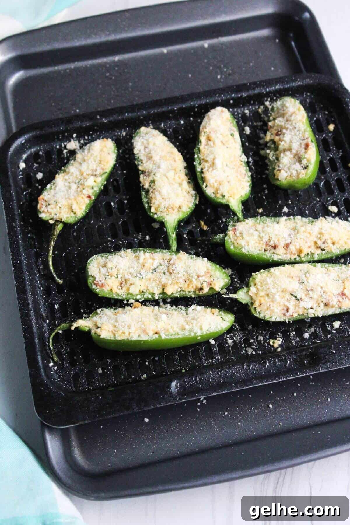 Panko breadcrumb topping added over filling.