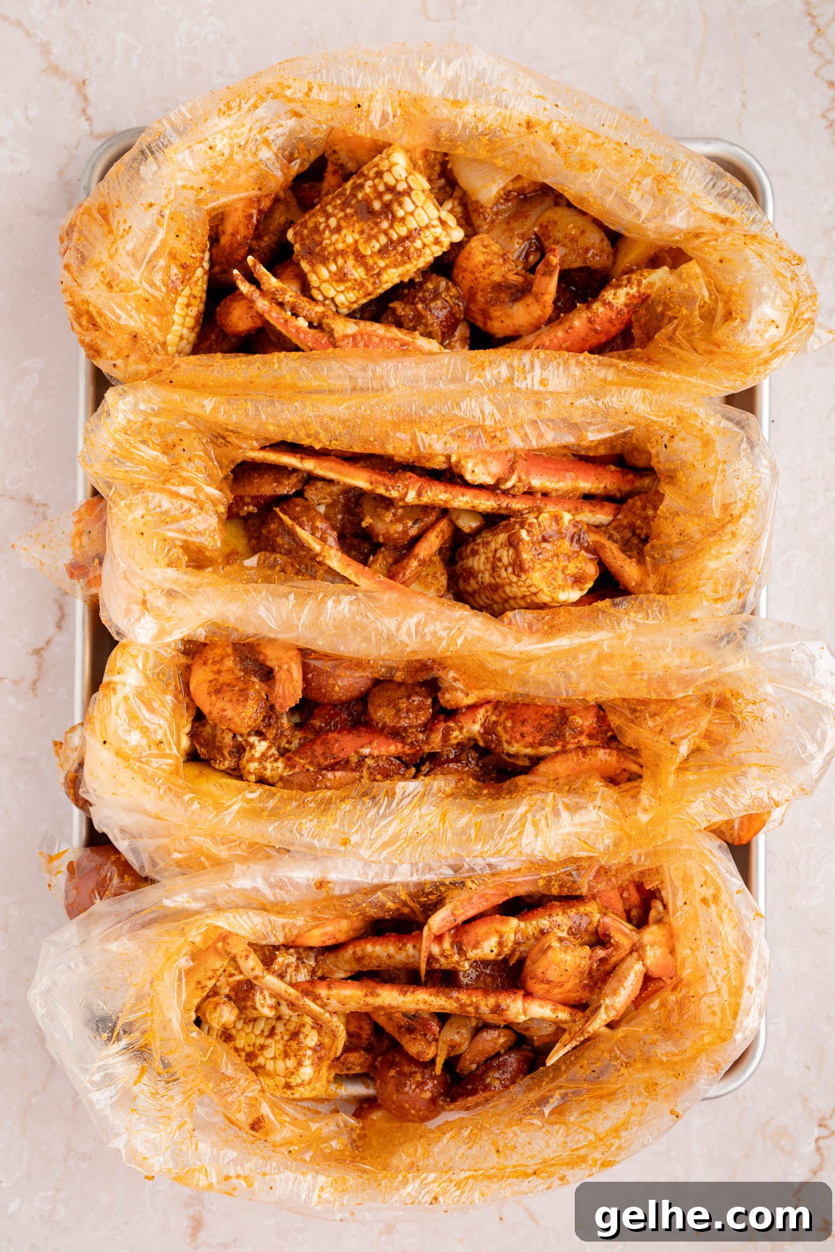The seafood boil in the bags after mixing everything together.