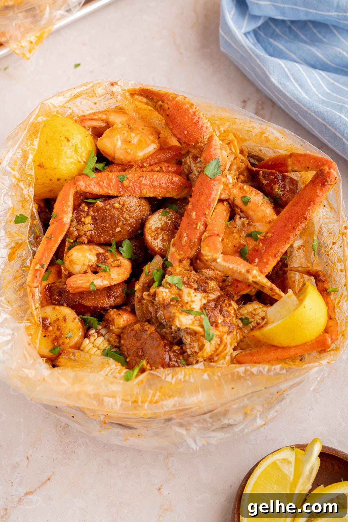 The seafood boil in a bag on a countertop for serving.