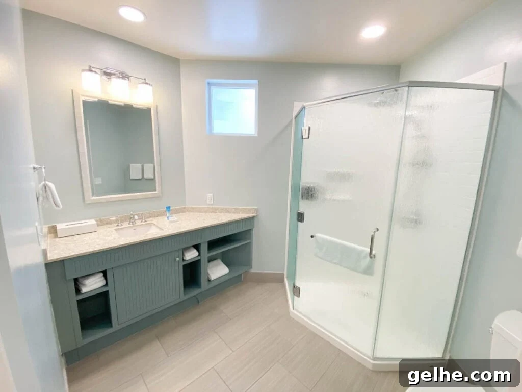 Disney's Old Key West 2-Bedroom Villa Guide 9 master bathroom shower room and vanity.