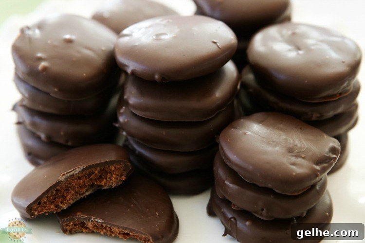 Thin Mints Cookies made with homemade buttery chocolate cookies dipped in mint fudge glaze. This simple recipe for copycat Thin Mints tastes even better than the original!