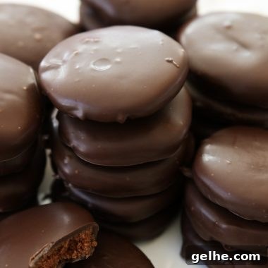 Thin Mints Cookies made with homemade buttery chocolate cookies dipped in mint fudge glaze. This simple recipe for copycat Thin Mints tastes even better than the original!