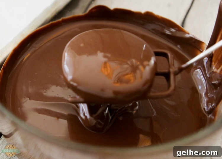Thin Mints Cookies made with homemade buttery chocolate cookies dipped in mint fudge glaze. This simple recipe for copycat Thin Mints tastes even better than the original!