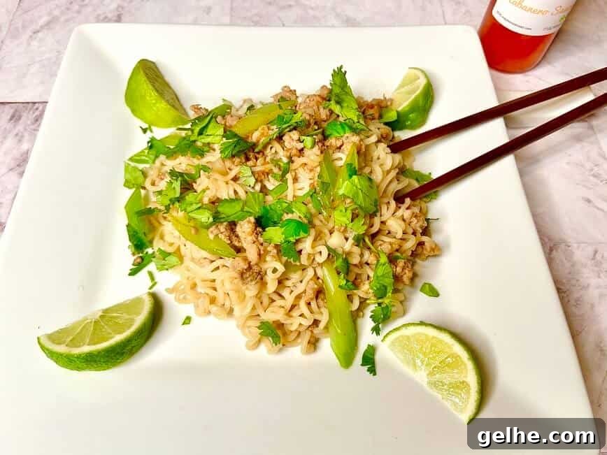 Served on a white plate with wedges of lime.
