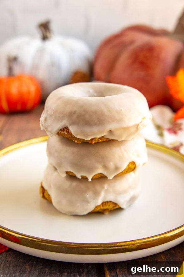 baked pumpkin donut with white glaze