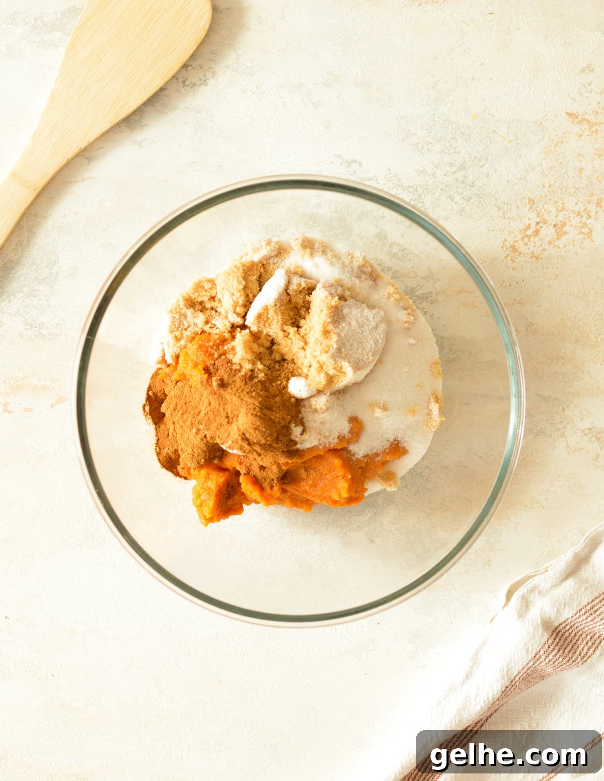Pumpkin Pie with Crunchy Graham Cracker Crust 4 a bowl with pumpkin puree, spices, and sugar