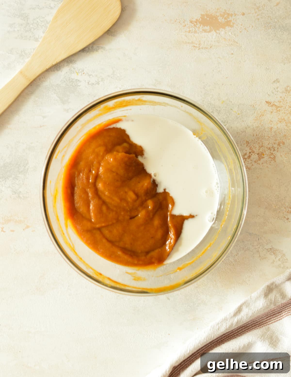Pumpkin Pie with Crunchy Graham Cracker Crust 6 a bowl of pumpkin with half and half on it