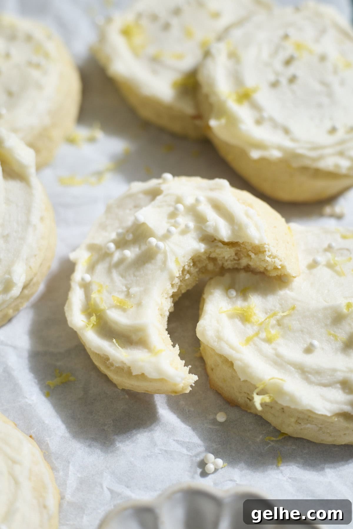 Lemon Sugar Cookies Made with Sourdough Discard 14 A bite taken out of a lemon cookie.