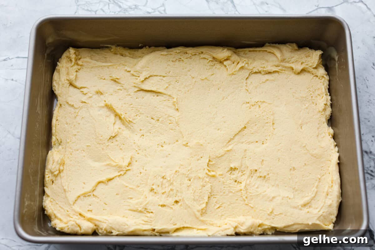 Batter spread in the bottom of the pan.