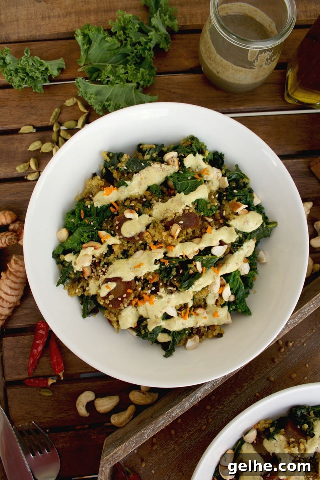 Healthy Quinoa Bowls with Kale, Carrots and Tahini Turmeric Dressing: seasonal healthy and gluten-free dinner. Delicious, well-balanced and flavorful dish.