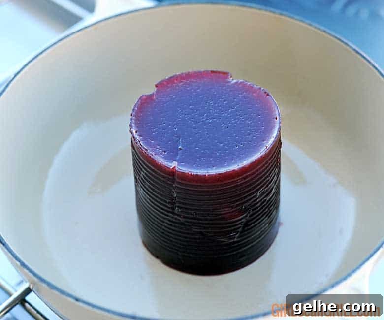 Cranberry Barbecue Turkey Burnt Ends Recipe 8 can-shaped cranberry sauce in white pot.