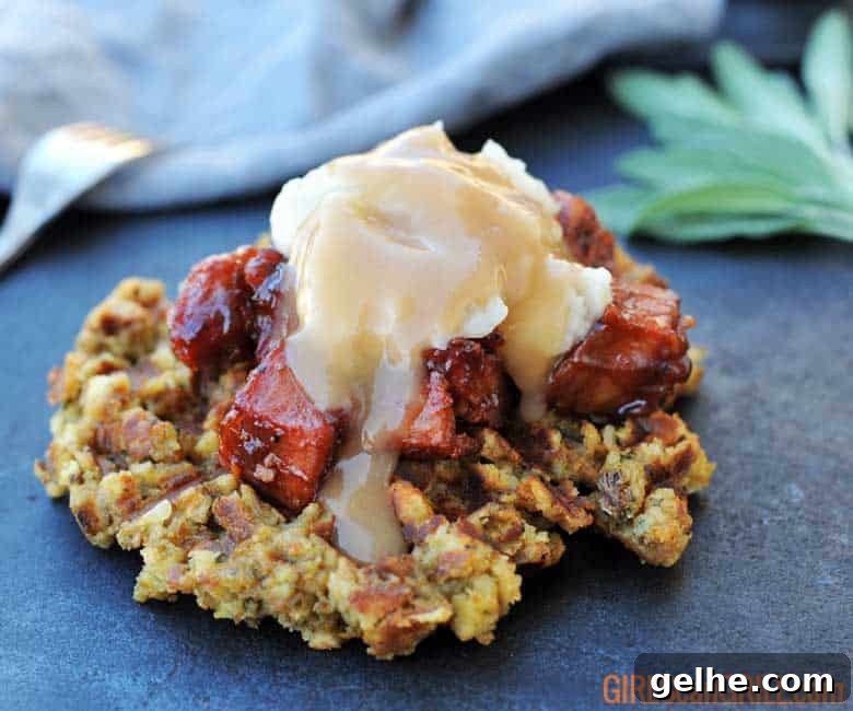 Cranberry Barbecue Turkey Burnt Ends Recipe 10 stuffing waffle with turkey burnt ends and potatoes and gravy on top.