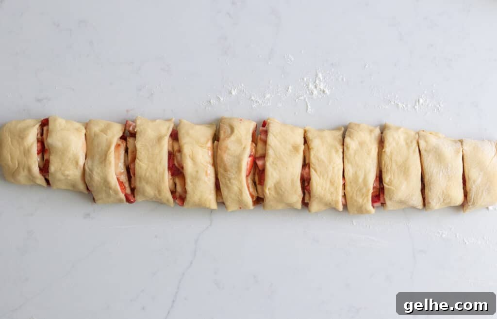 strawberry sweet rolls dough log cut into slices