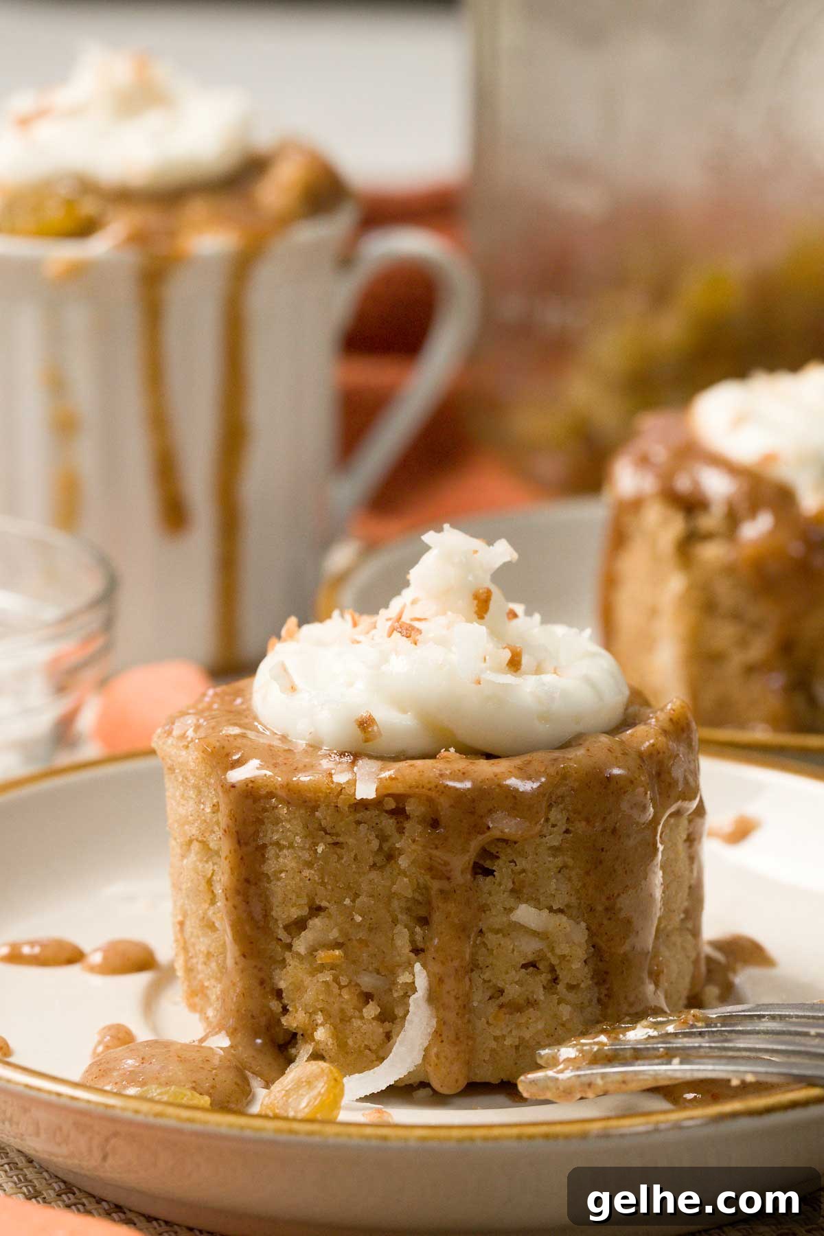 Carrot Mug Cake cut in half as a mini cake.