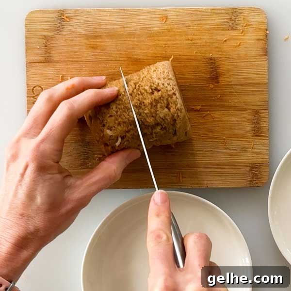 Carrot Mug Cake cut in half as a mini cake.