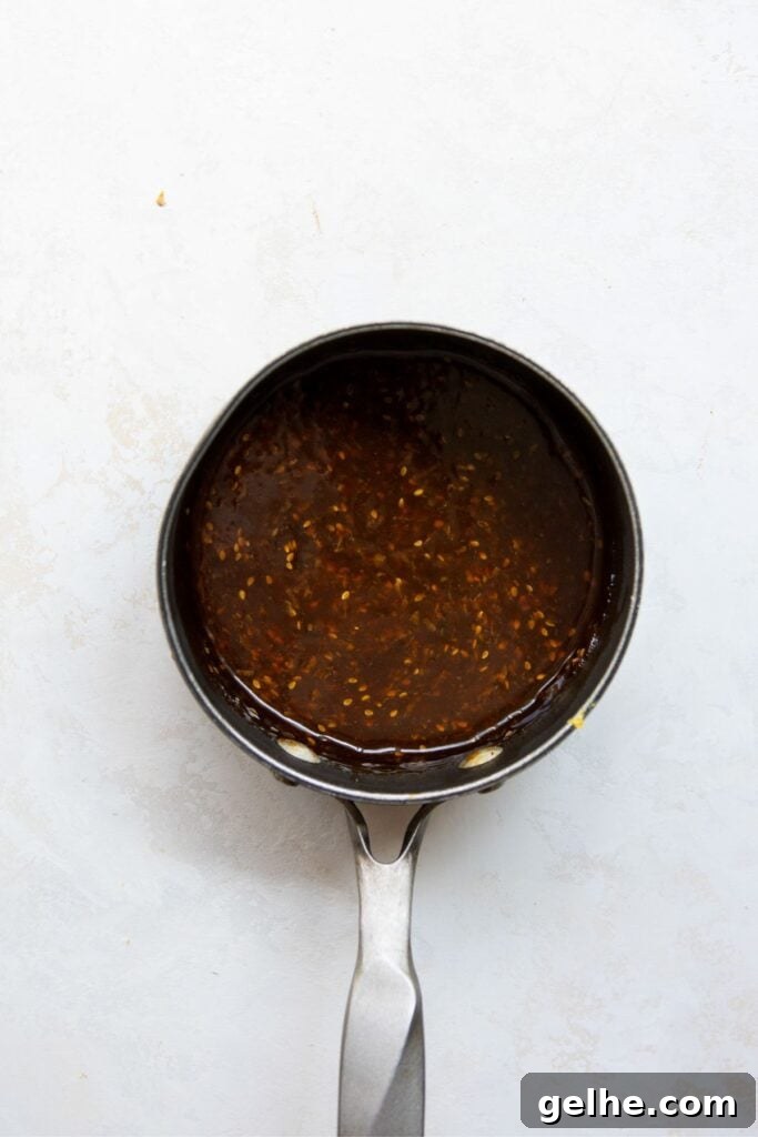 sticky homemade teriyaki sauce made with honey in a sauce pan