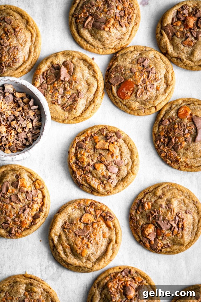 Chocolate-Dipped Peanut Butter Butterfinger Cookies