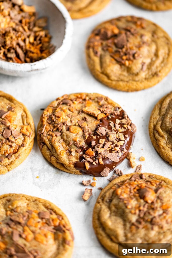 Chocolate-Dipped Peanut Butter Butterfinger Cookies
