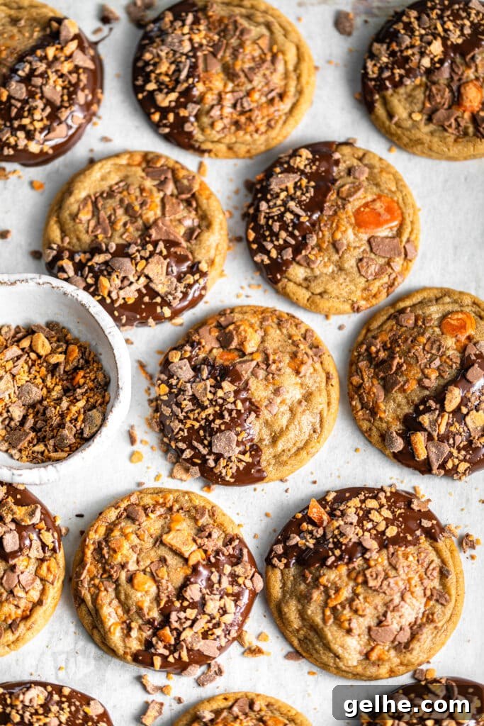 Chocolate-Dipped Peanut Butter Butterfinger Cookies
