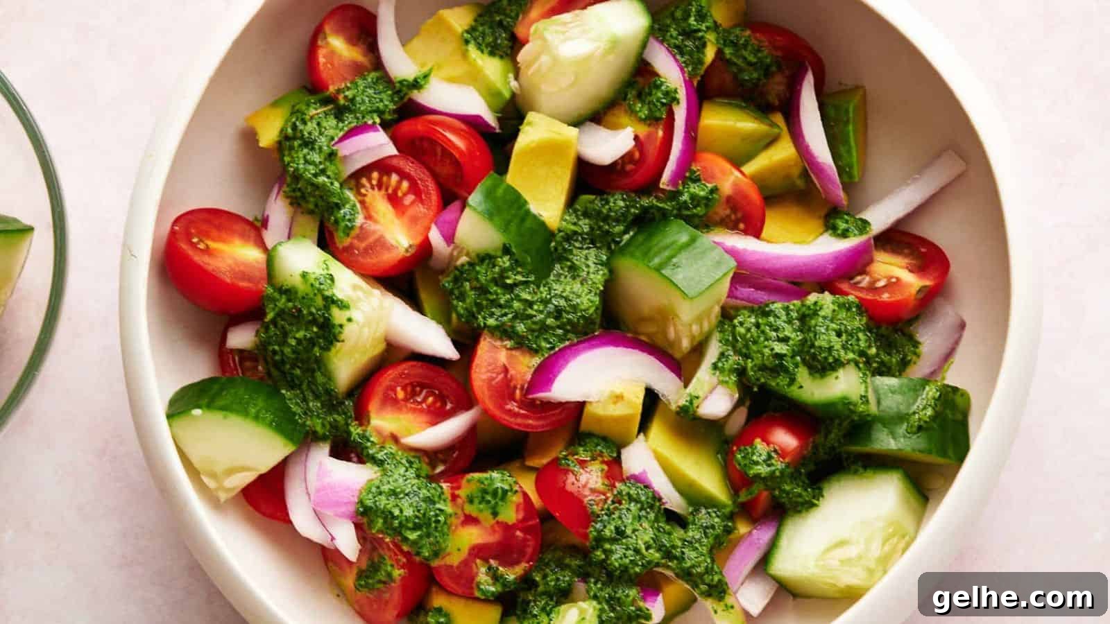 Avocado salad with dressing in a serving bowl.