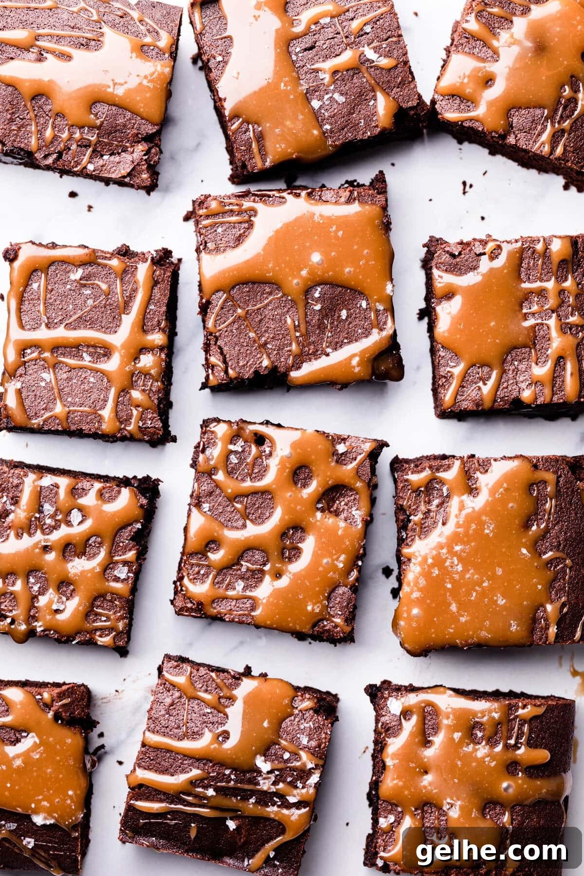 Guinness Chocolate Brownies with Rich Stout Flavor 11 square slices of Guinness brownies topped with caramel and sea salt flakes.