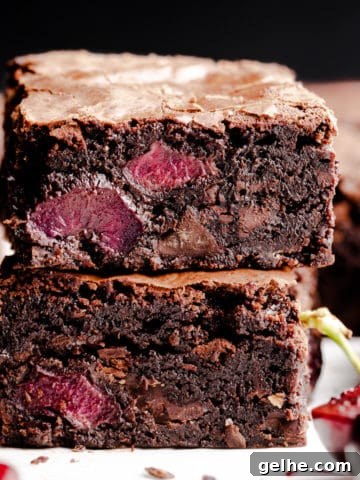 super close up at two slices of chocolate cherry brownies