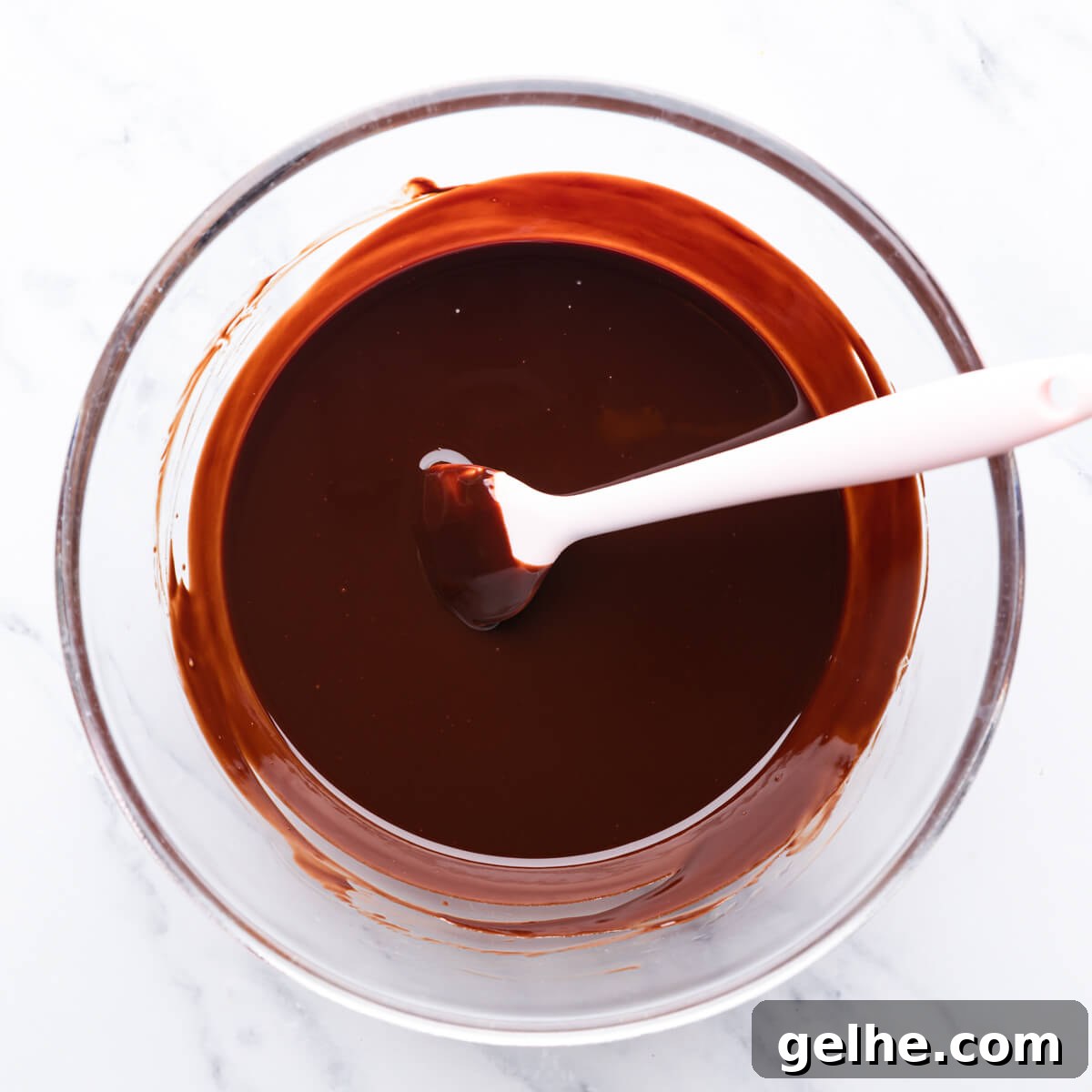 Guinness Chocolate Brownies with Rich Stout Flavor 4 bowl with melted chocolate and butter.