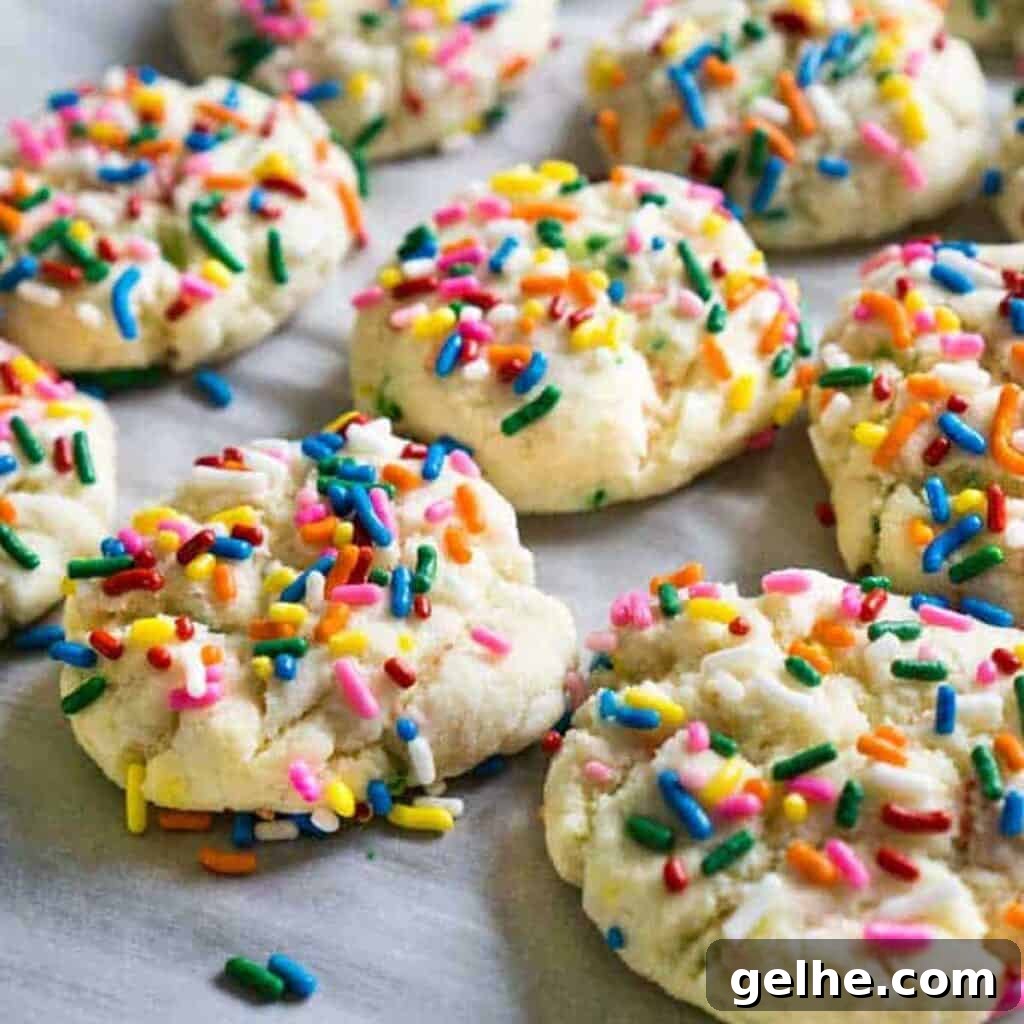 funfetti cookies on parchment paper