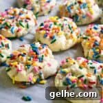 funfetti cookies on parchment paper