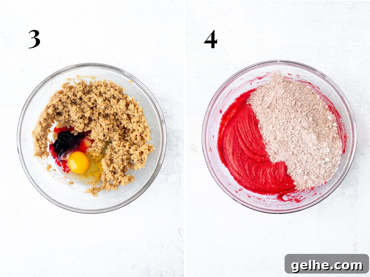 Bowl of creamed butter and sugars with egg, food coloring and vanilla added, and bowl of dough red cookie dough mixture with dry ingredients added to the bowl