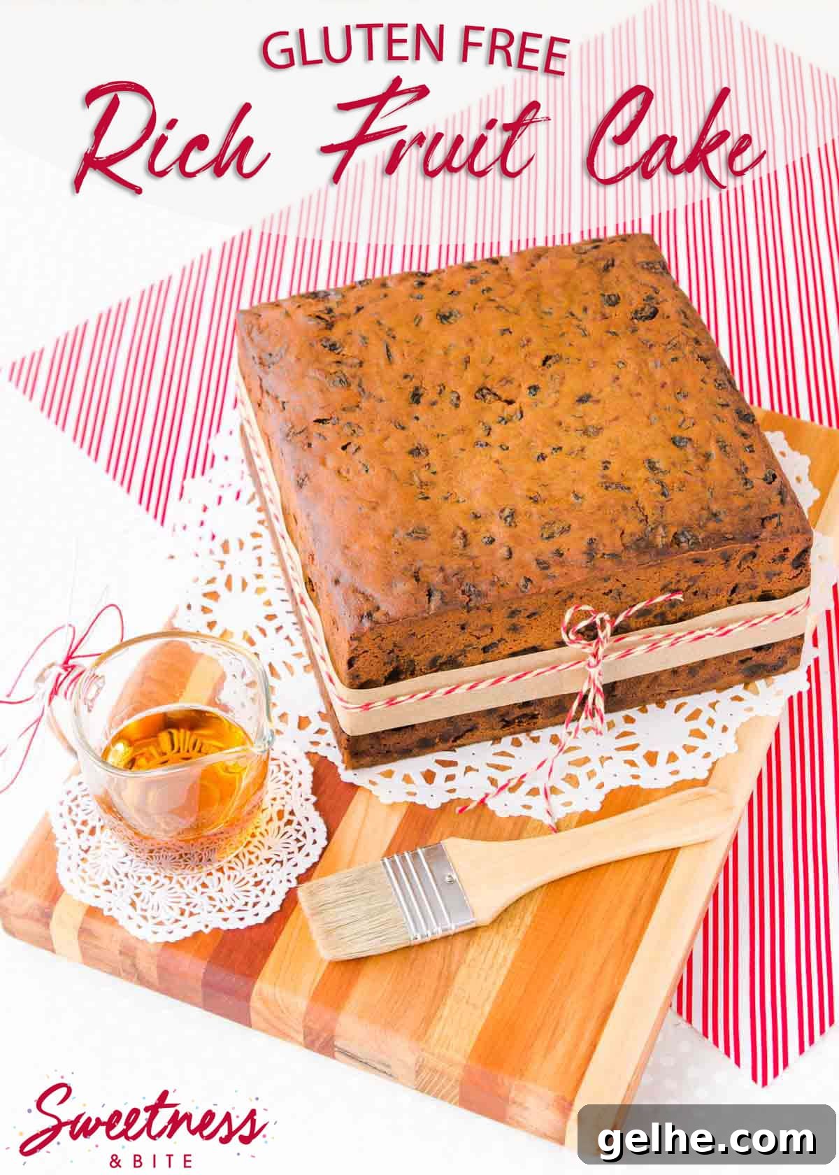 Square gluten free Christmas cake on a wooden board, sitting on a red and white striped cloth, text reads "gluten free fruit cake".
