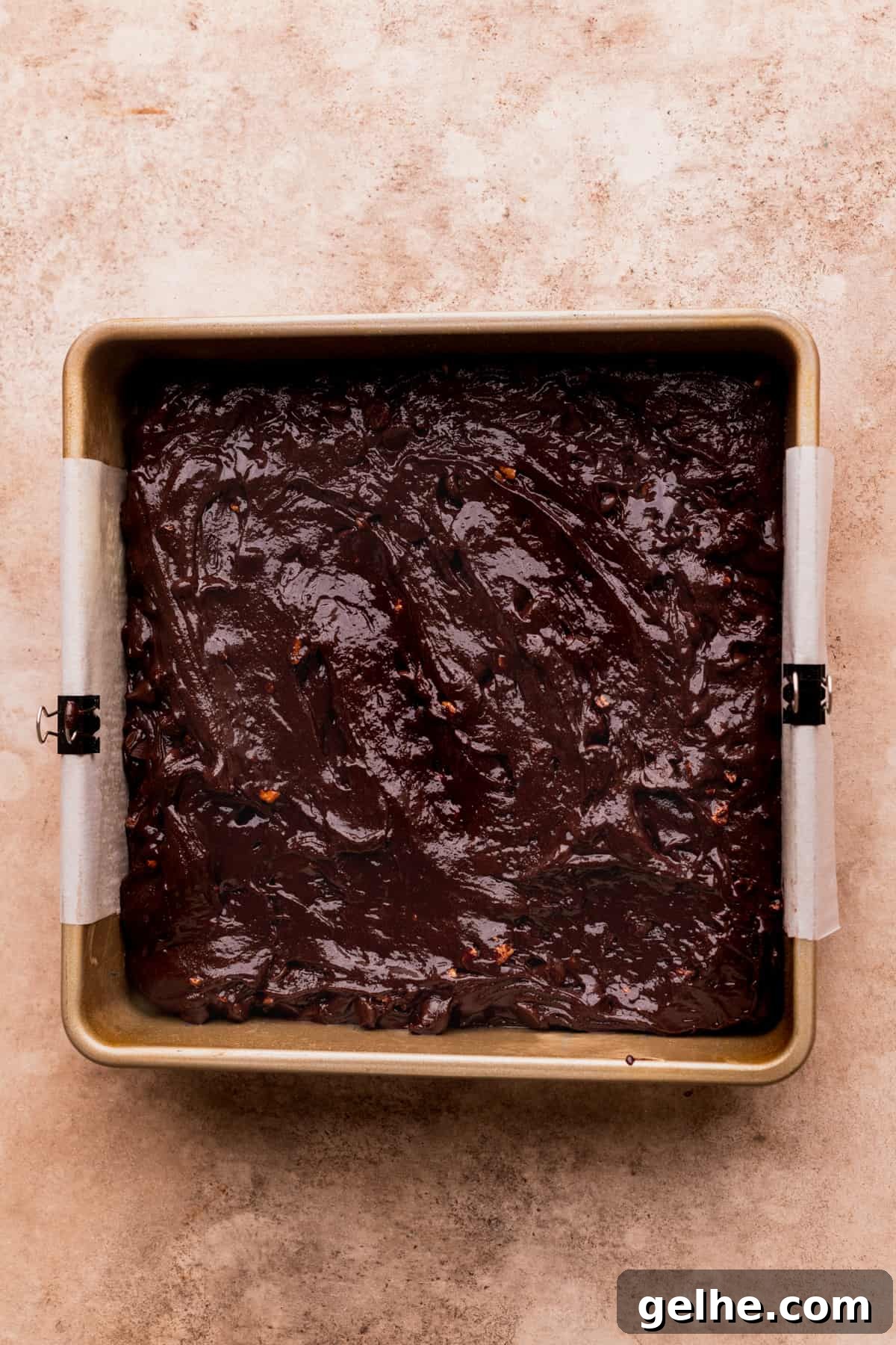 Brownie batter in the pan.